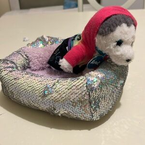 Dog bed and Dog stuffed animal toys.